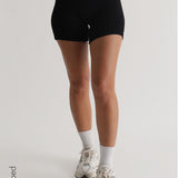 Shorts mit hoher Taille und Mikrorippenmuster - Schwarz